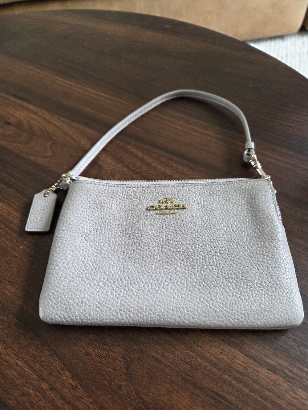 Coach Light Gray Pebbled Leather Wristlet with Gold Logo